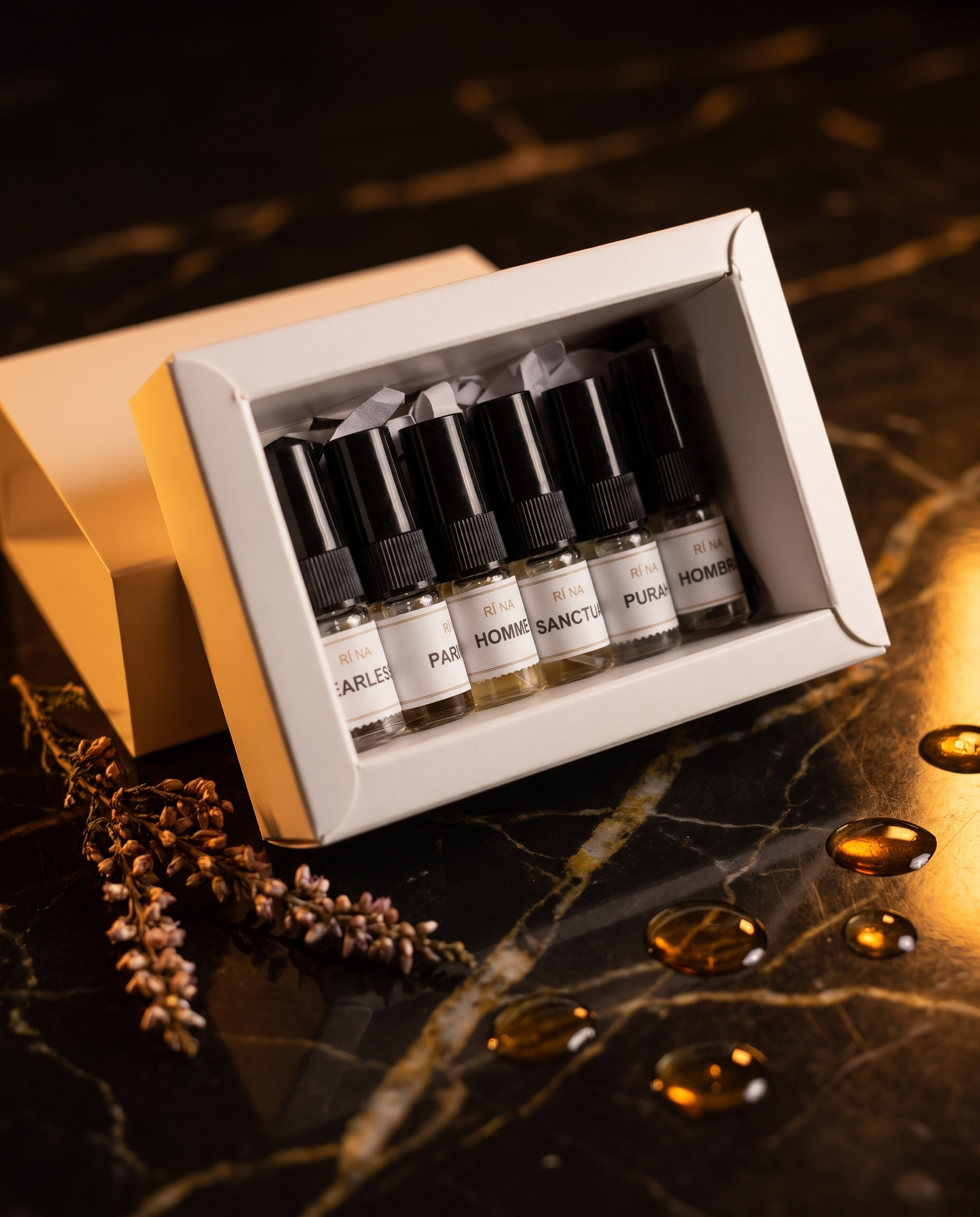 RÍ NA Discovery Box - six mystery mini fragrance samples, premium hero shot